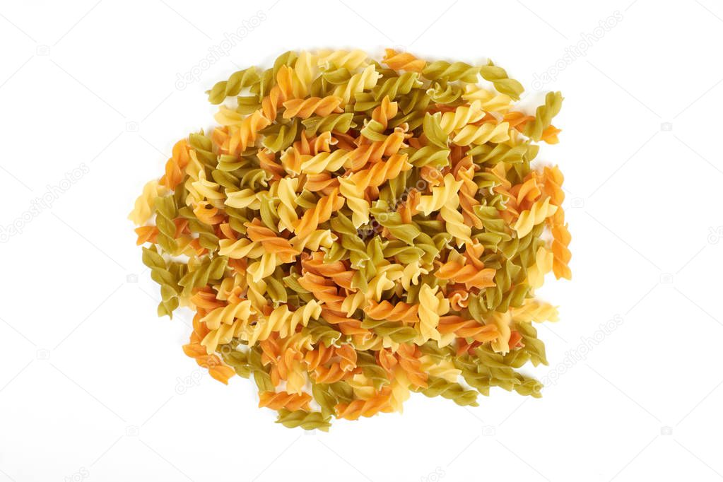Raw colorful italian fusilli pasta isolated on white