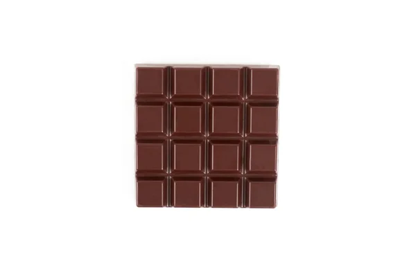 Barra di cioccolato fondente isolata su sfondo bianco. — Foto Stock