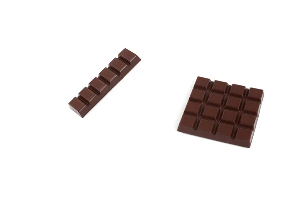 Conjunto com diferentes tipos de chocolate no fundo branco . — Fotografia de Stock