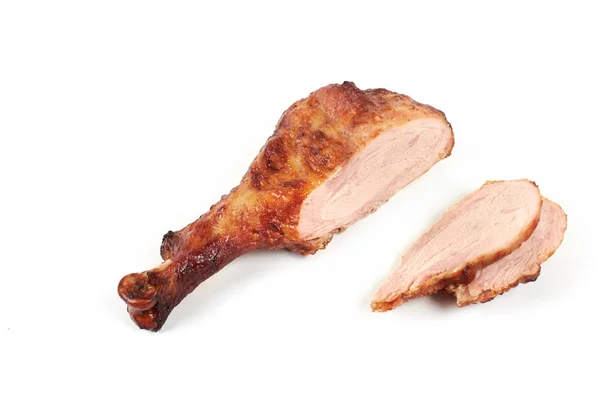 Roast turkey leg and sliced turkey meat isolated on white background. — Stock Photo, Image