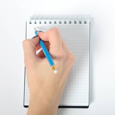 Beyaz arka plan ile defter üzerinde yazma el. izole