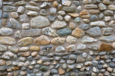 çakıl taşlı bir duvarın yakın plan görüntüsü