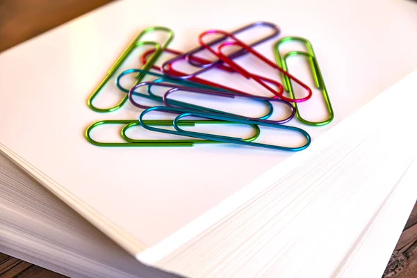 Big Multi Colored Office Paper Clips Pile Sheets White Paper — Stock Photo, Image