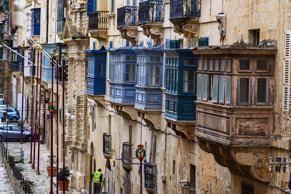Valletta, Malta, on January 8, 2019. The traditional various picturesque balconies characteristic of old town houses are one of symbols of Malta