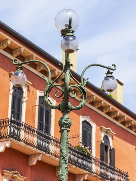 Verona, Italy, on April 27, 2019. A beautiful streetlight at Piazza Bra Square, one of central squares of the city.