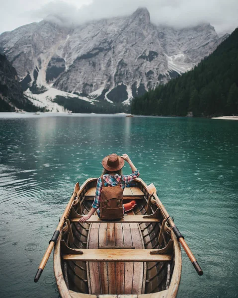 Young Traveler Woman Backpack Boat Mountains Alpine Lake Alps Dolomites Royalty Free Stock Images