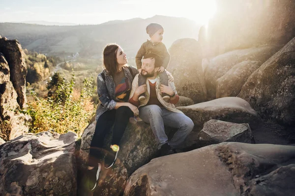 Young family with little son spending time together outside. — Stock Photo, Image