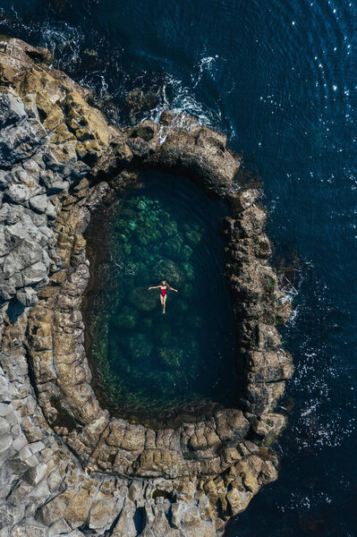Beautiful Girl Red Swimsuit Swims Natural Pool Top View Drone Royalty Free Stock Photos