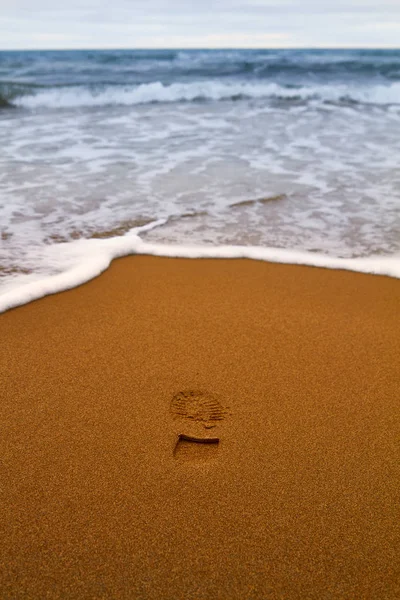 Summer sandy beach with footprint