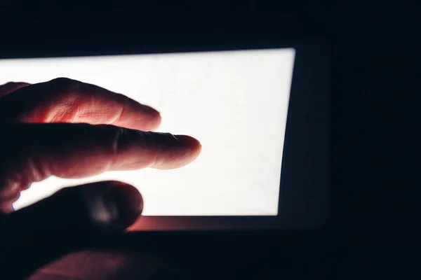 Close up of hand using touch screen of digital tablet
