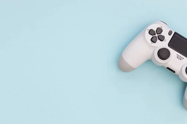 Video games white gaming controller isolated on blue color backg — Stock Photo, Image