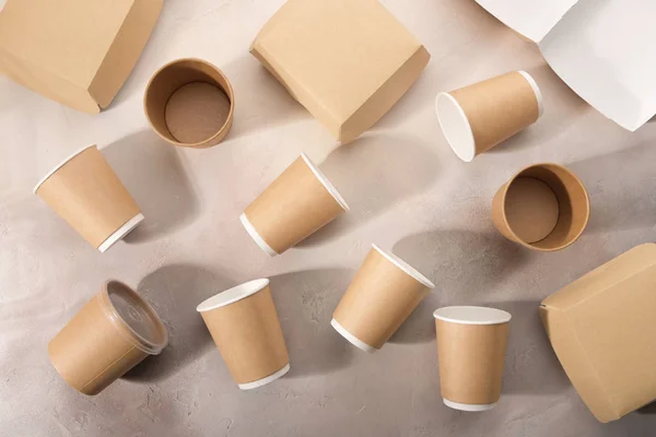 Biodegradable tableware on light background. Secondary processing. The concept of zero waste.