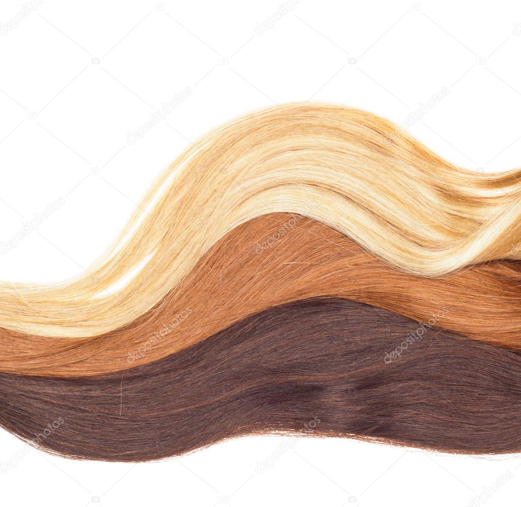 Picture of remy woman's hair extensions in different colors isolated on white