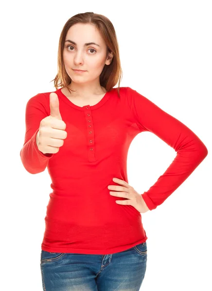 红色上衣和蓝色牛仔裤的年轻妇女的图片显示竖起大拇指 — 图库照片