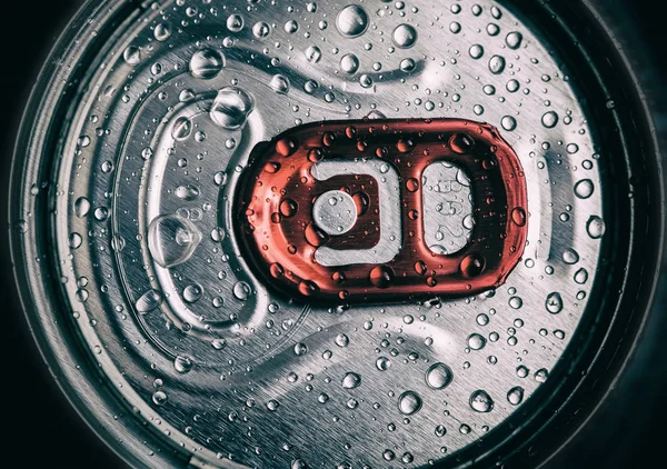 metallic can of beer with water droops, view from the top