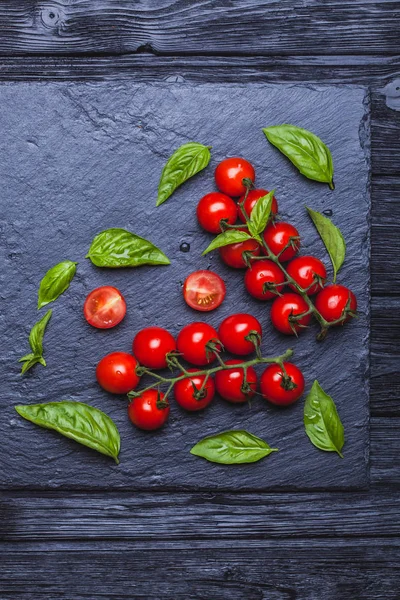 Fresh Cherry Tomatoes Black Slate Board Background Basil Top View — Stock Photo, Image