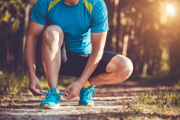 Runner Tying Shoelaces Sneakers Morning Jogging Forest — Stock Photo, Image