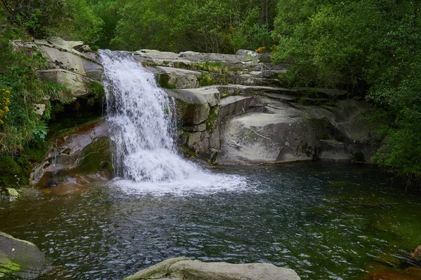 Natural pool with a waterfall — Stock Photo, Image