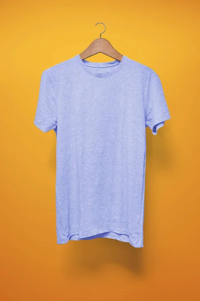 Light Blue Shirt Hanger Orange Background — Stock Photo, Image