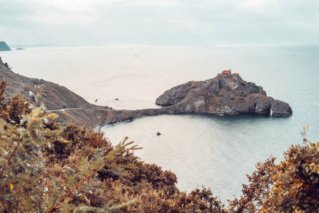 Gaztelugatxe island on Vizcaya, Spain. It has a small hermit on top