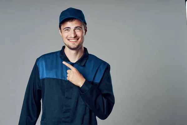 Studio Shot Portrait Young Handsome Worker Pointing — Stock Photo, Image