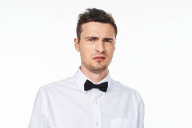 Young   man  is sad   in studio,  isolated  background