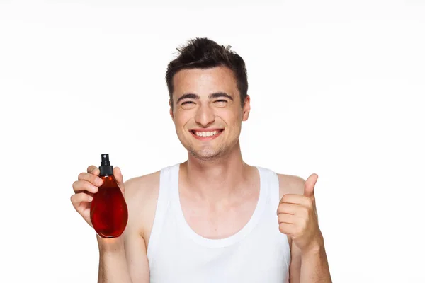 Studiový Snímek Mladý Pohledný Muž Vlasy Sprej Ukazující Palec Nahoru — Stock fotografie