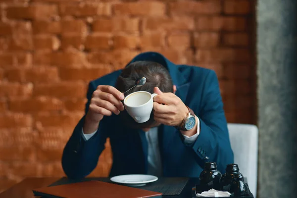 Young  businessman  having coffee brake