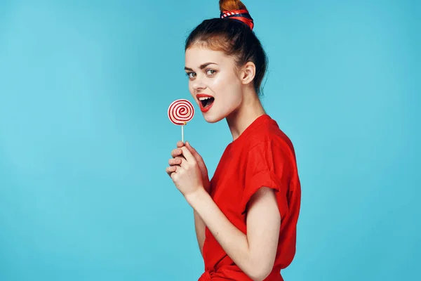 Yoyng woman with       lollipop