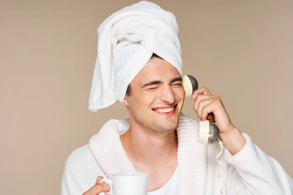 Young Emotional Man Bathrobe Cup Coffee Talking Vintage Phone Studio — Stock Photo, Image