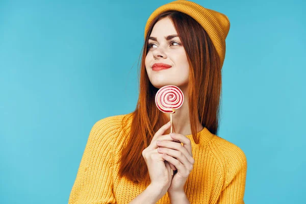 Yoyng woman with       lollipop