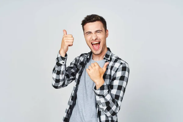 Young Man Thumbs Studio Isolated White Background — Stock Photo, Image