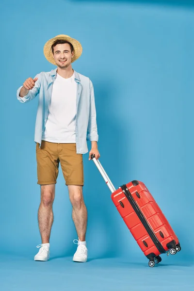 Young Man Red Suitcase Studio — Stock Photo, Image