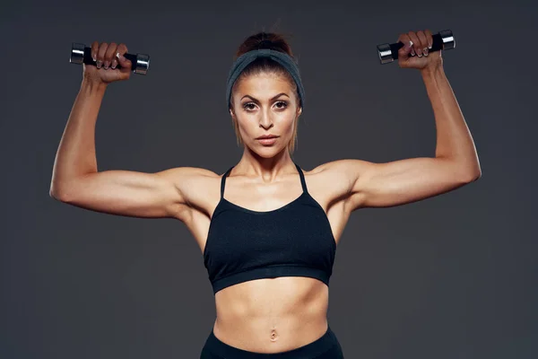 Athletic Woman Exercising Dumbbells Studio Shot — Stock Photo, Image