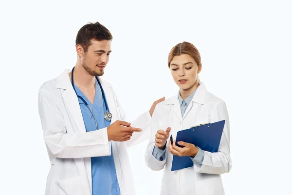 Young Doctor Nurse Have Discussion Studio Isolated Background — Stock Photo, Image