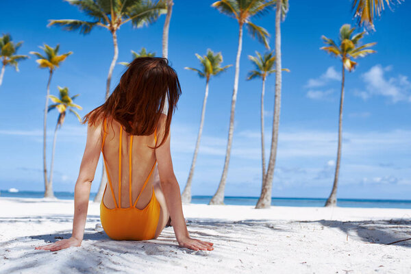 young beautiful woman relaxing on the beach