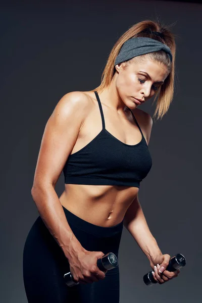 Athletic Woman Exercising Dumbbells Studio Shot — Stock Photo, Image