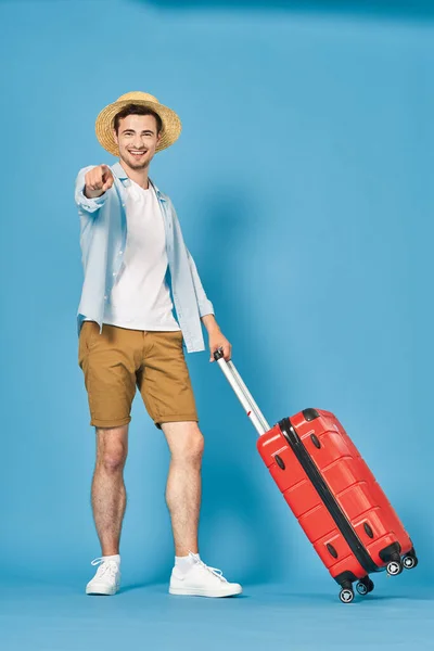 Young Man Red Suitcase Studio — Stock Photo, Image