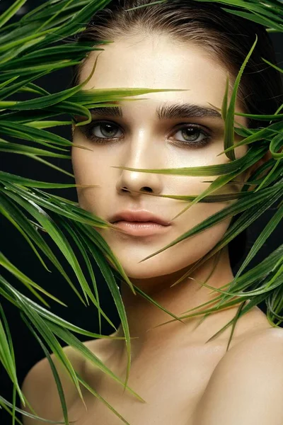 Female face make-up natural look of nature green leaves health — Stock Photo, Image