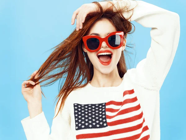 Cheerful beautiful glamor woman smile white sweater with american flag Royalty Free Stock Images