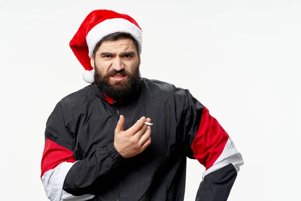 Noel şapkalı adam spor giyiniyor. — Stok fotoğraf