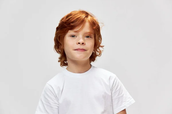 Cute redhead boy in white t-shirt cropped view of freckles on his face — Stock Photo, Image