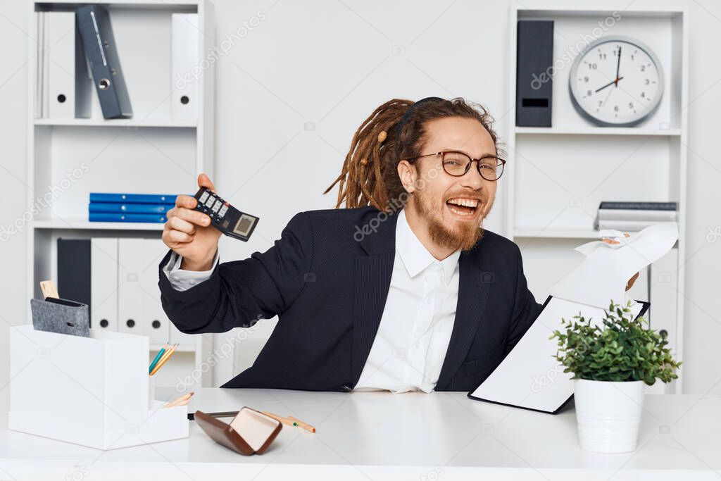 Young businessman sitting in the office working