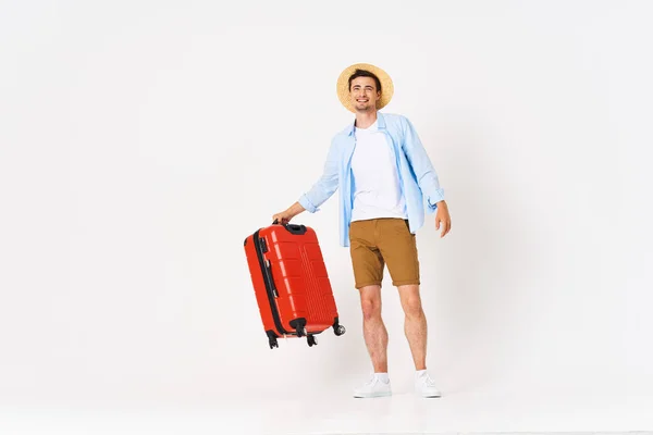 Estudio Disparo Joven Hombre Feliz Turista Con Maleta Roja — Foto de Stock