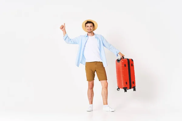 Studio Shot Young Happy Man Tourist Red Suitcase Showing Thumb — Stock Photo, Image