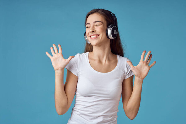 young woman in headphones in studio 