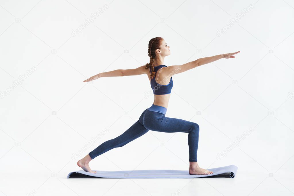 young beautiful woman  practicing yoga in studio 