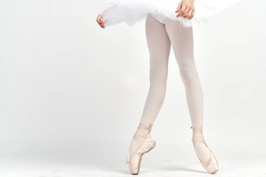 Puanlı ayakkabılar balerin balerin balerin tutu dans çocuk ışık arka plan kırpılmış görünüm