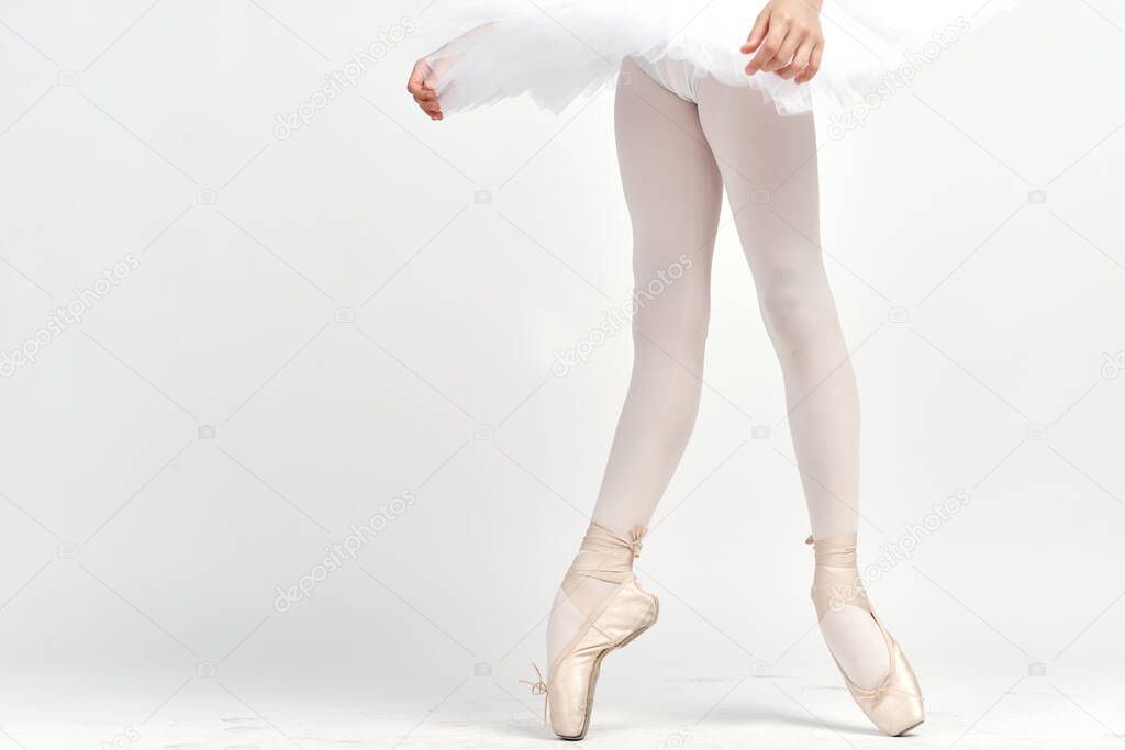 pointe shoes ballerina tutu dance child light background cropped view