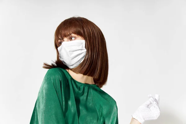 Woman in fashion dress posing in medical mask virus covid-19 — Stock Photo, Image